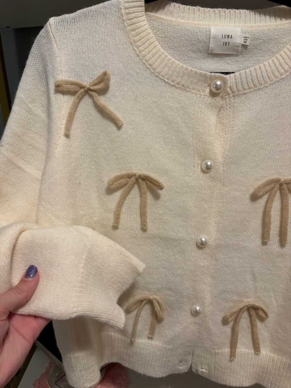 Luna Ivy Ivory Bow-Accent Pearl Button Cardigan - Picture 4 of 5